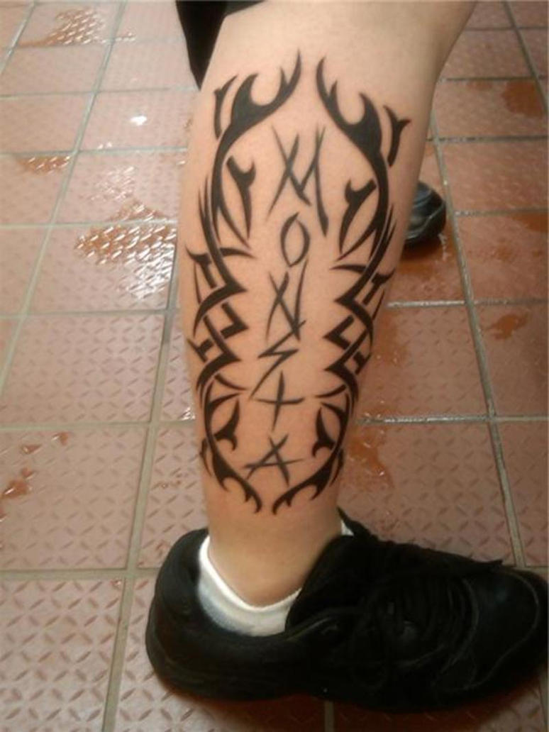 Tribal On Leg Tattoo