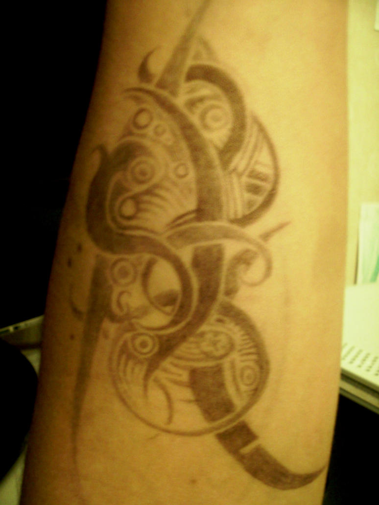Small pen tribal tattoo by