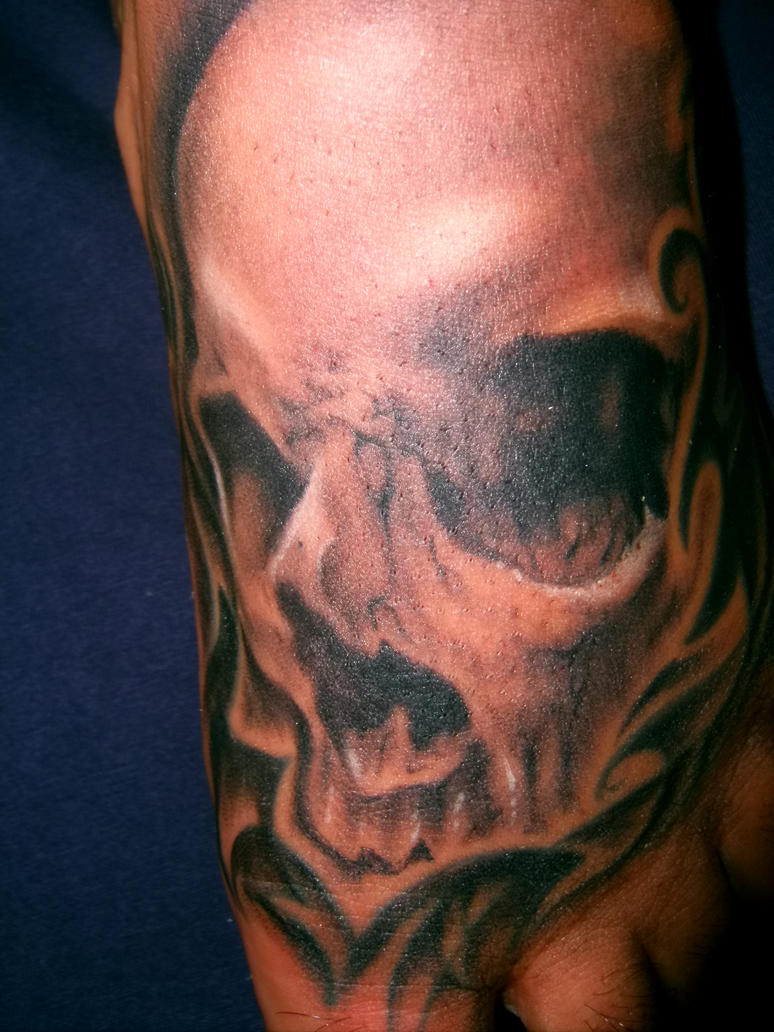 Freehand skull tattoo on foot